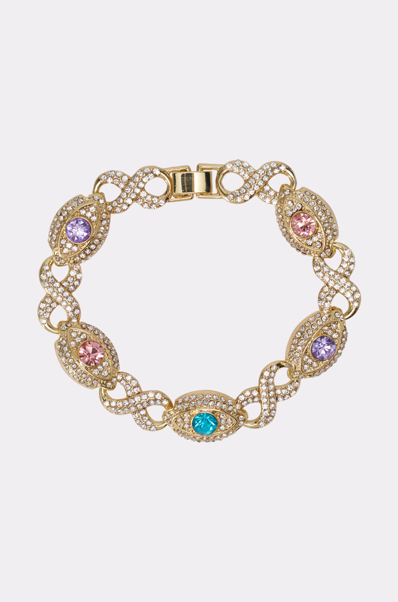 The EYE SEE YOU BRACELET features a gold-tone chain with five oval pink, purple, and blue gems, each framed by pavé crystals. Its elegant design is finished with a decorative clasp for a refined look. 0