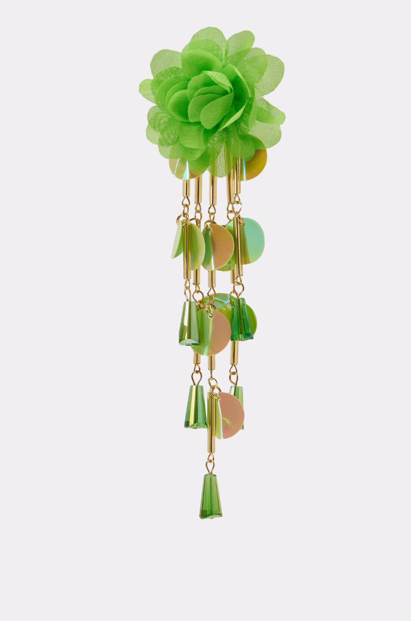 Make a statement with the NO ENVY EARRING—a bold accessory featuring a vibrant green fabric flower, gold chains, green and gold beads, and disc-shaped charms for an eye-catching floral look. 4