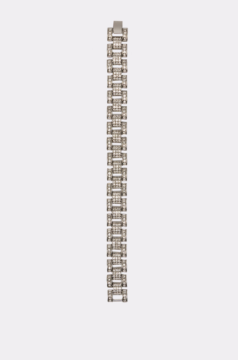 The BABY ICE ME OUT BRACELET is a silver rhinestone link bracelet with rows of square-cut stones in a geometric pattern, sparkling brilliantly against a plain white background. 4