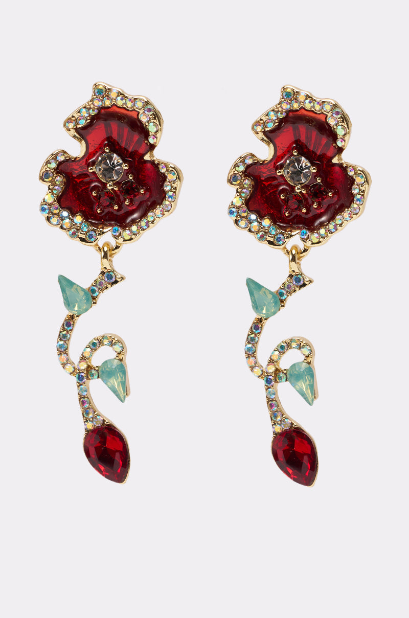 ROSEY EARRING: Ornate rose-shaped drop earrings with red flower motifs, gold edges, sparkling gemstones, and dangling green and red jeweled accents that resemble leaves and buds. 0