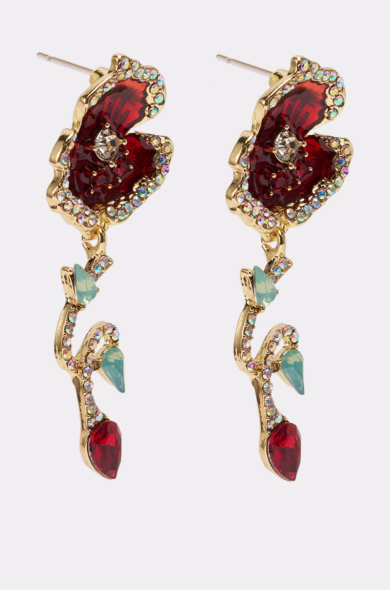 The ROSEY EARRING features an ornate floral and vine design with ruby-red gemstones, green accents, and sparkling rhinestones, creating a vintage-inspired drop earring look. 2