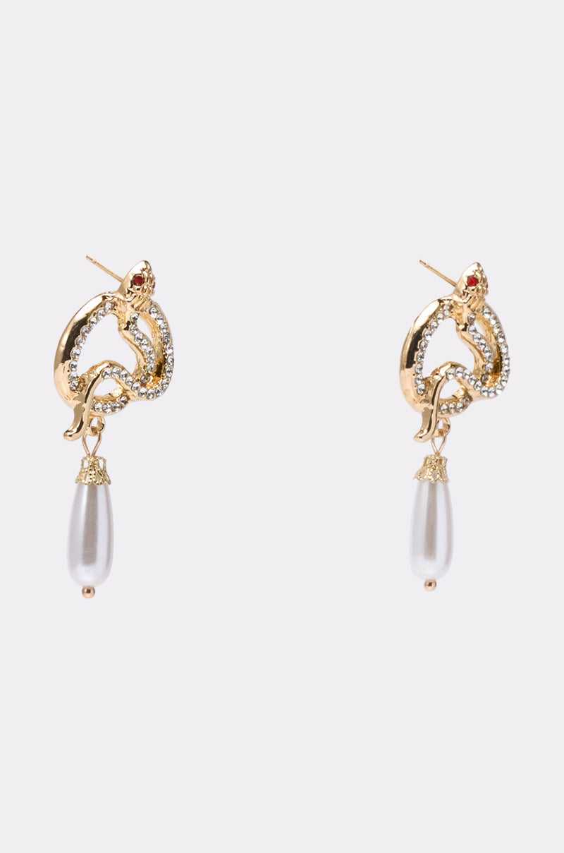 The UR A SNAKE EARRING features gold-tone snake shapes adorned with rhinestones and finished with dangling white teardrop pearl accents. 2