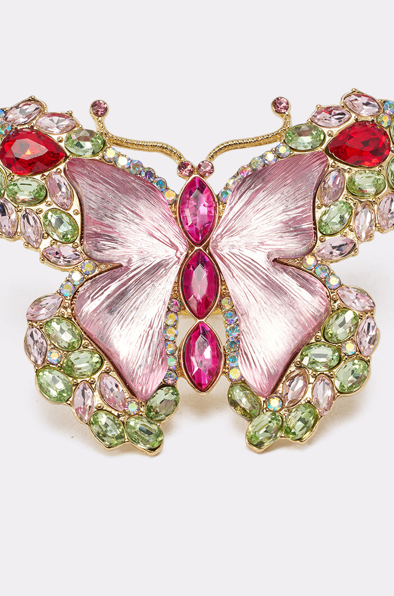 Pair the SPREAD YOUR WINGS RING with a butterfly brooch featuring pink wings, red and pink gemstones, plus green and light pink gem accents set in gold-colored metal for a stylish look. 6