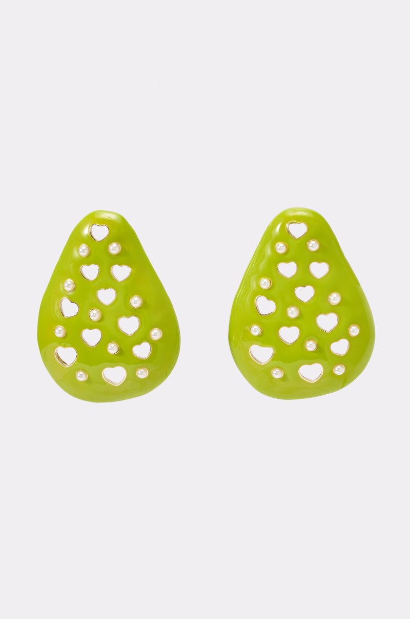 Bright green "TAKE A BITE PEAR EARRING" statement earrings shaped like teardrops, each adorned with multiple small heart-shaped cutouts and tiny gold or pearl-like studs, set against a plain white background. These green enamel earrings add a playful yet elegant touch to any look.