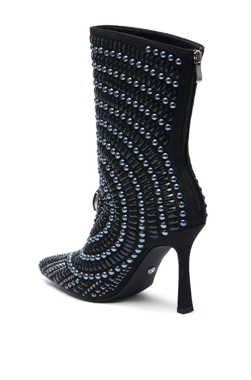 The AZALEA WANG HILLEL PEWTER RHINESTONE BOOTIE is a black stiletto heel boot with concentric rows of pewter rhinestones, a pointed toe, and a back zipper.