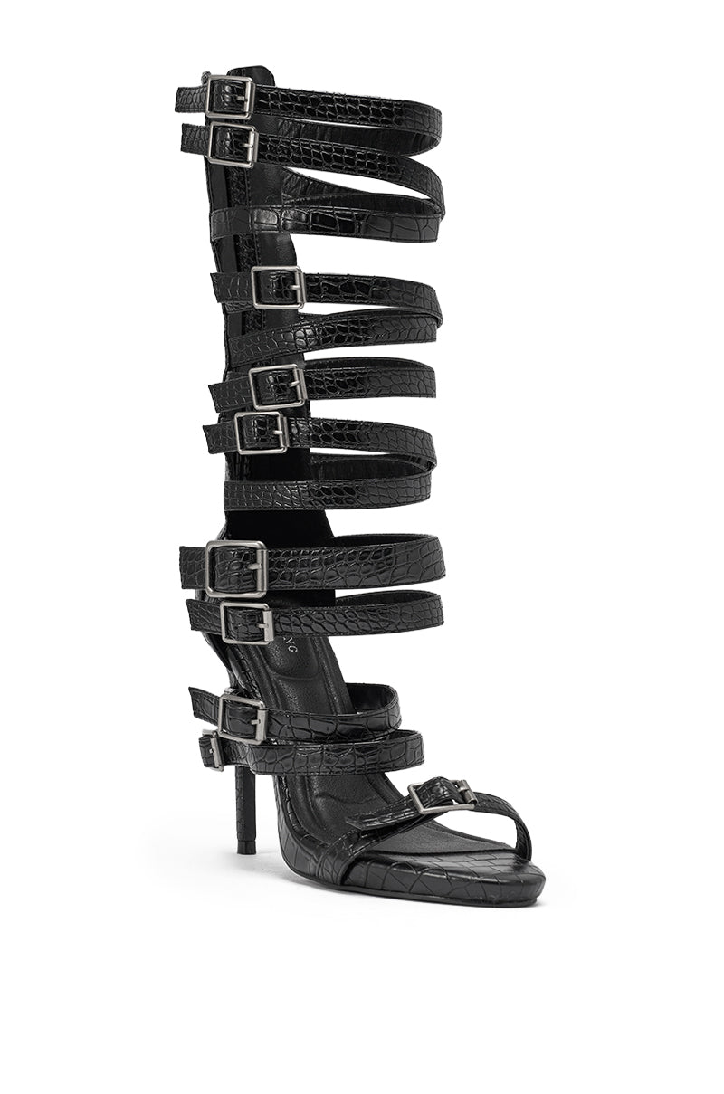 The AZALEA WANG HITCH Black Croc Hardware Embellished Stiletto Sandal features a high heel, open toe, multiple strappy silver buckles up to the knee, and bold croc-embossed faux leather for standout style. 4