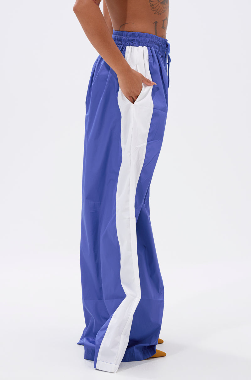BREAKING THE RULES TRACK PANT IN ROYAL BLUE – AKIRA