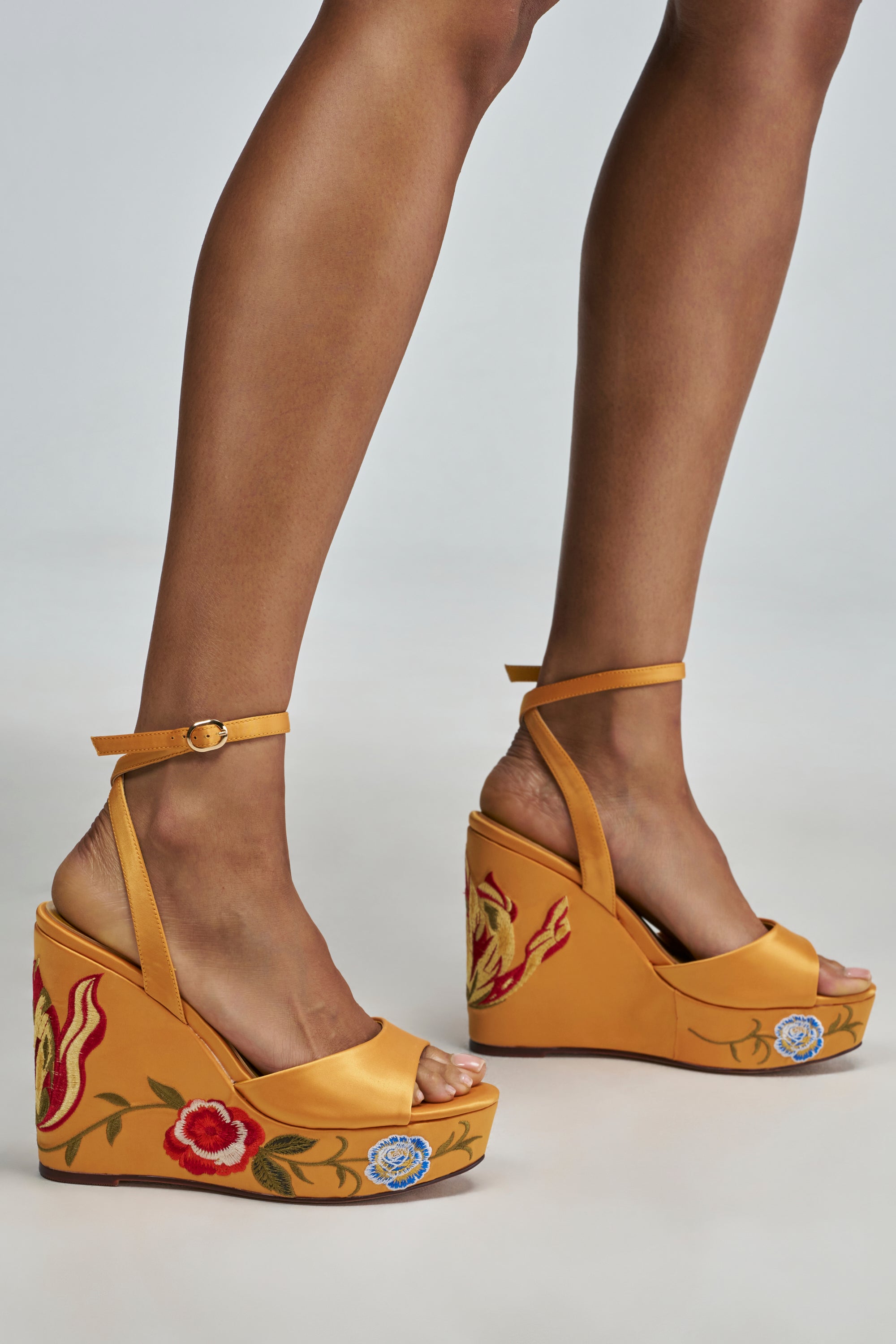 AZALEA WANG IMANI MUSTARD WEDGE SANDAL featuring mustard yellow boho-chic wedge sandals with ankle straps and floral embroidery on the platform base.