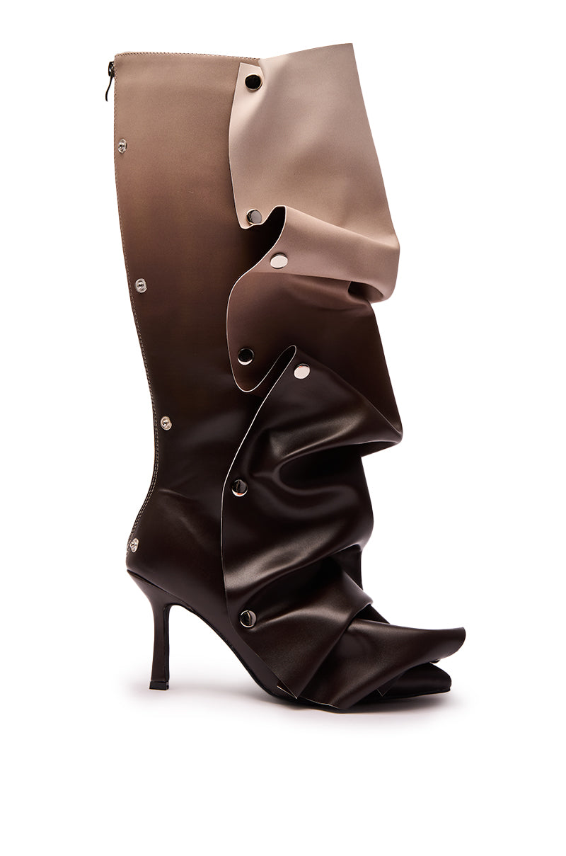 The AZALEA WANG IMOGINE Brown Multi Folded Detail Stiletto Boot is knee-high with ruffled, layered faux leather in gradient beige to dark brown, a pointed toe, and metallic snap buttons. 3