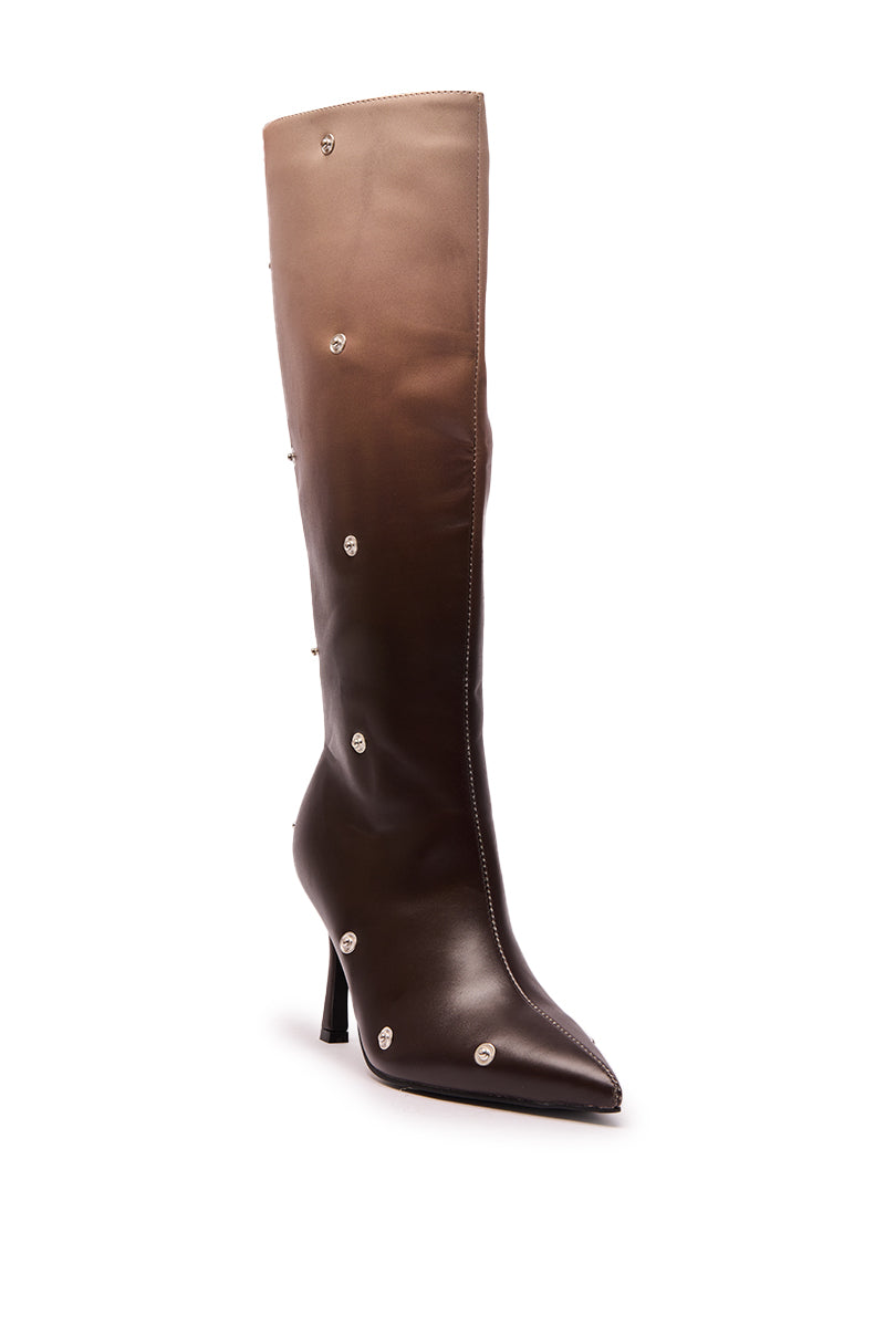 The AZALEA WANG IMOGINE BROWN MULTI FOLDED DETAIL STILETTO BOOT is a knee-high, pointed-toe stiletto in dark brown ombre faux leather with silver stud accents on the side and front. 6