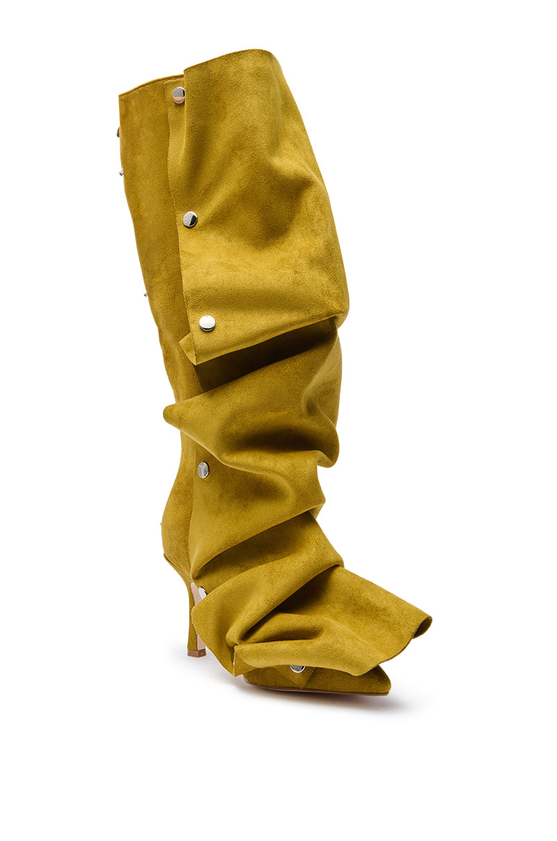 The AZALEA WANG IMOGINE OLIVE FOLDED DETAIL STILETTO BOOT is a slouchy, knee-high, olive faux suede boot with silver button accents, a pointed toe, and a mid-height stiletto heel.