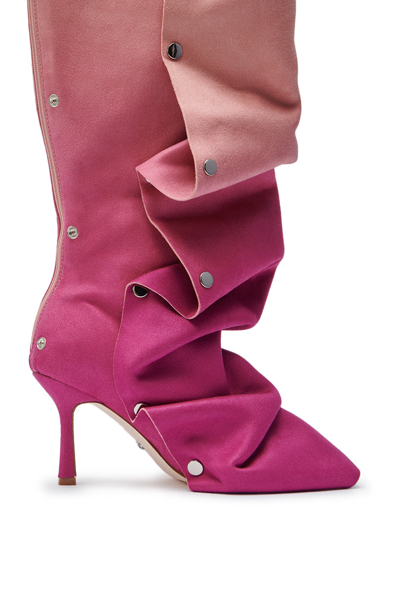 The AZALEA WANG IMOGINE PINK MULTI FAUX SUEDE BOOT is a mid-calf style in two pink shades, featuring dramatic ruffles, silver snap buttons along the side, a pointed toe, and a short slender heel.