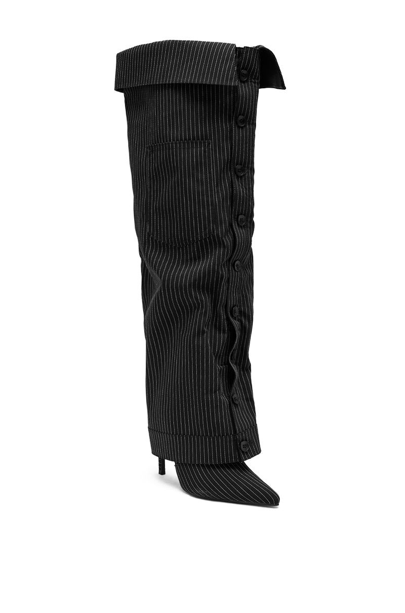 The AZALEA WANG IMRI BLACK SHIRTING STRIPED STILETTO BOOT features a pinstripe design that mimics black suit pants, complete with buttons, a pocket, and a folded waistband detail at the top.
