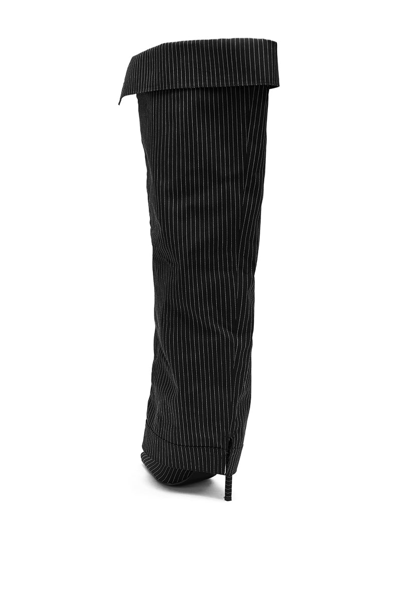 The AZALEA WANG IMRI BLACK SHIRTING STRIPED STILETTO BOOT, featuring tall black pinstripes, a wide folded cuff, and a slightly slouched silhouette, is displayed on a white background.