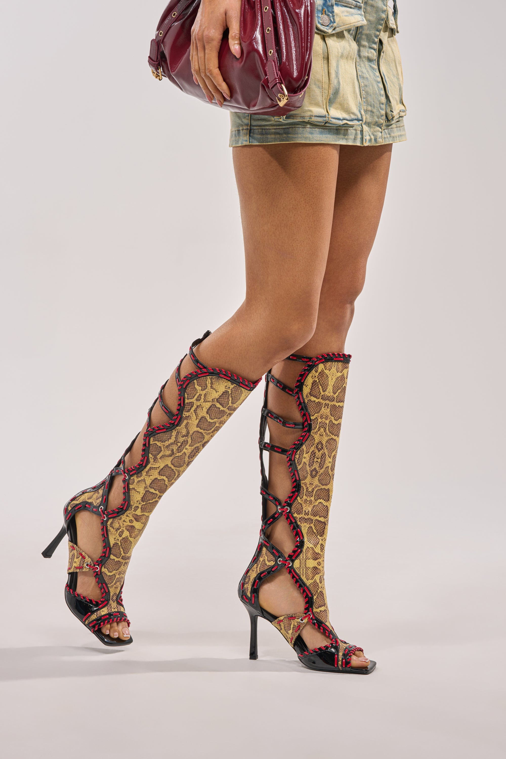 AZALEA WANG INDRANI HIGH SHAFT YELLOW SNAKE PRINT GLADIATOR SANDAL