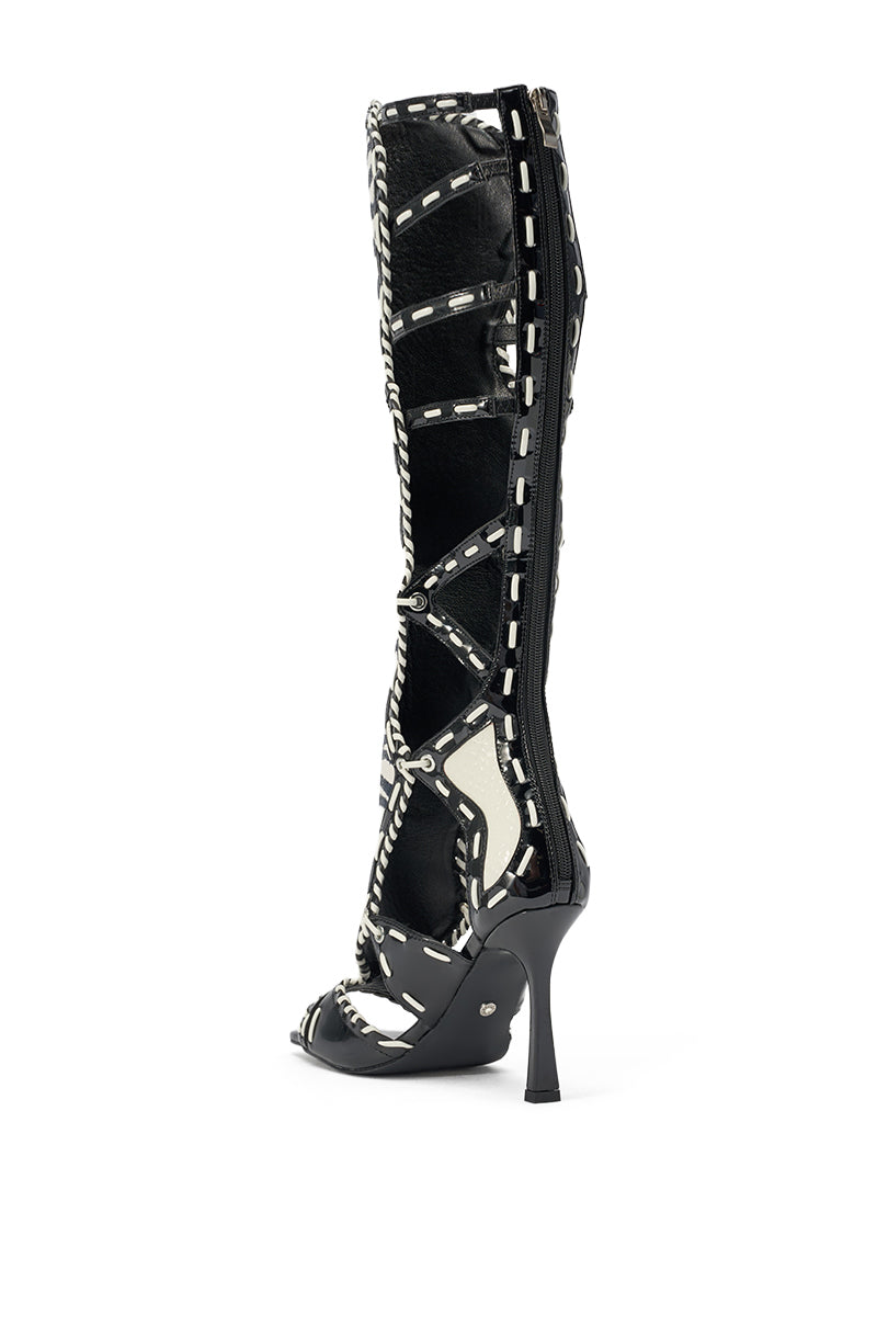 The AZALEA WANG INDRANI High Shaft Black and White Zebra Print Gladiator Sandal is showcased against a plain white background. 5