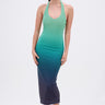A woman poses against a plain background in the UNDER THE SEA RHINESTONE OMBRE MIDI DRESS, which fades from green to dark blue. She styles it with a high ponytail and green-yellow heels for a striking bodycon look.