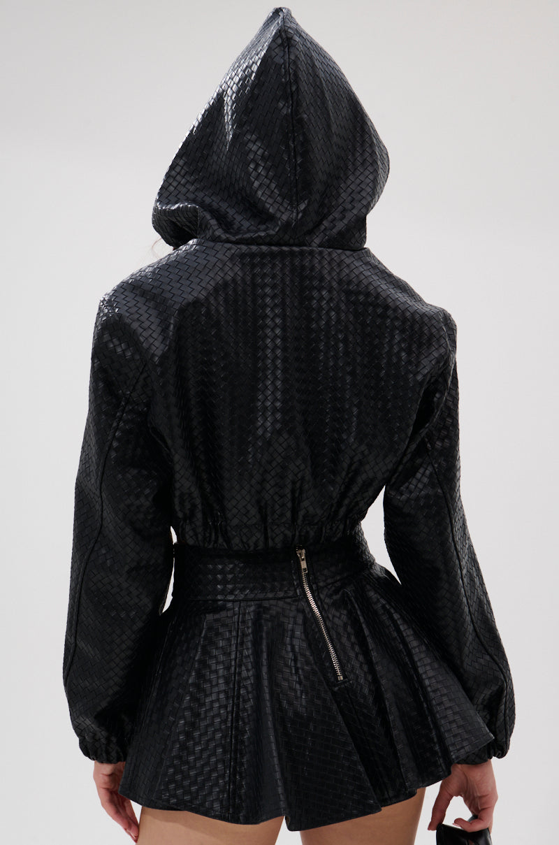 A person is seen from the back wearing the shiny KYLIE HOODED BOMBER paired with a matching high-waisted flared skirt featuring a vertical visible zipper. 8