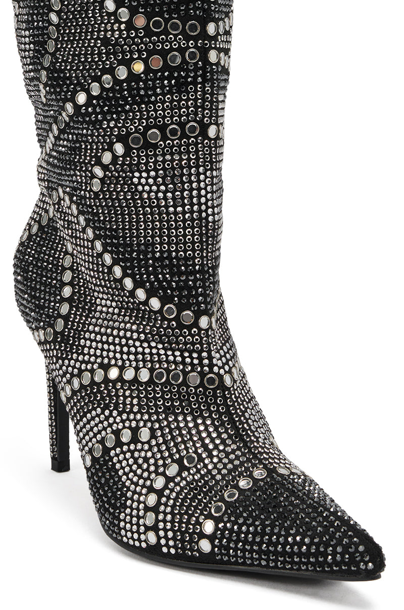 A close-up of the AZALEA WANG ISILDA BLACK MULTI SEQUIN STILETTO BOOT, a black pointed-toe knee-high boot embellished with shimmering sequins in bold, intricate patterns for a striking, glamorous look.