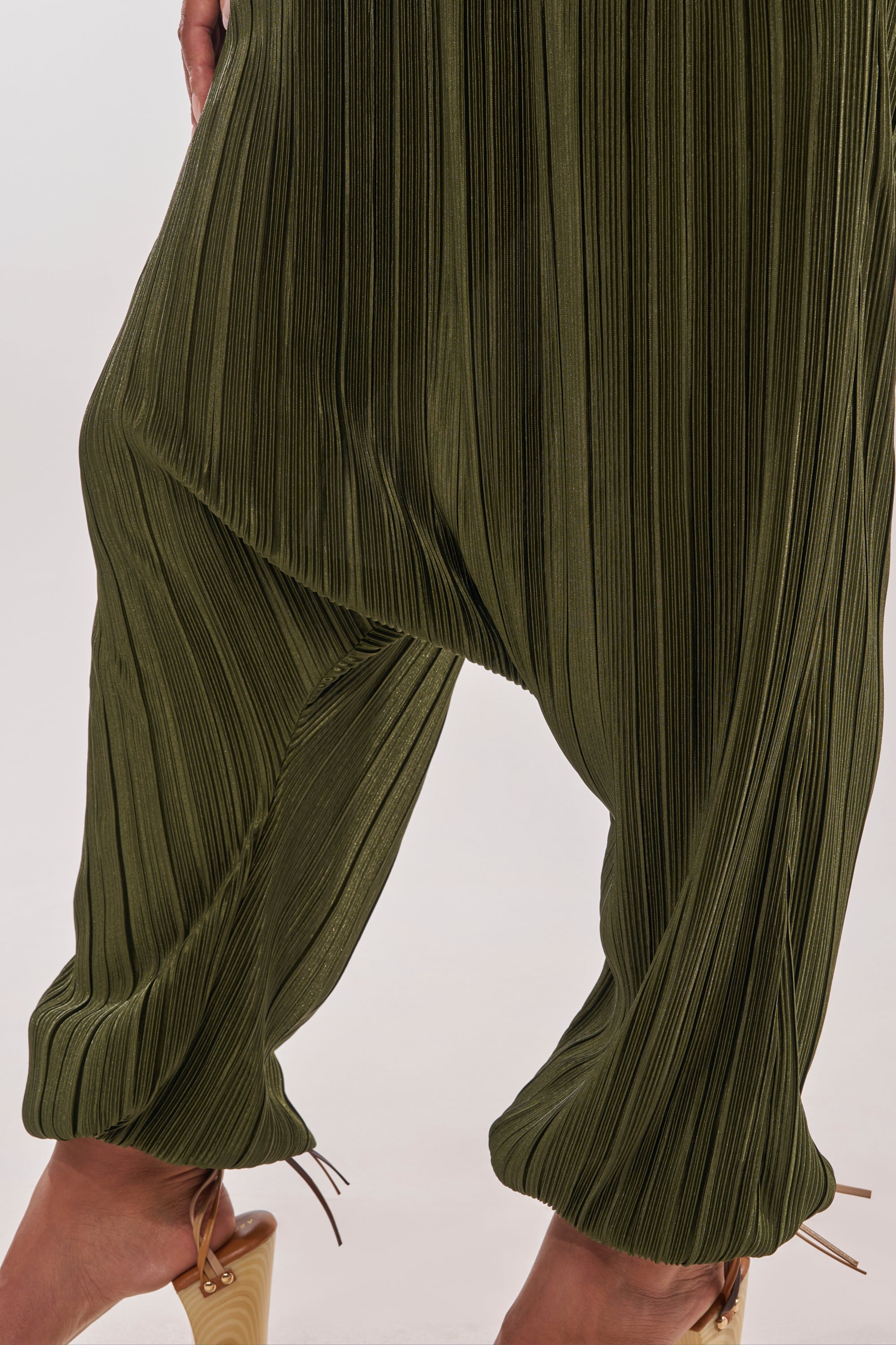 FROM THE CITY DROP CROTCH JUMPSUIT IN OLIVE – AKIRA
