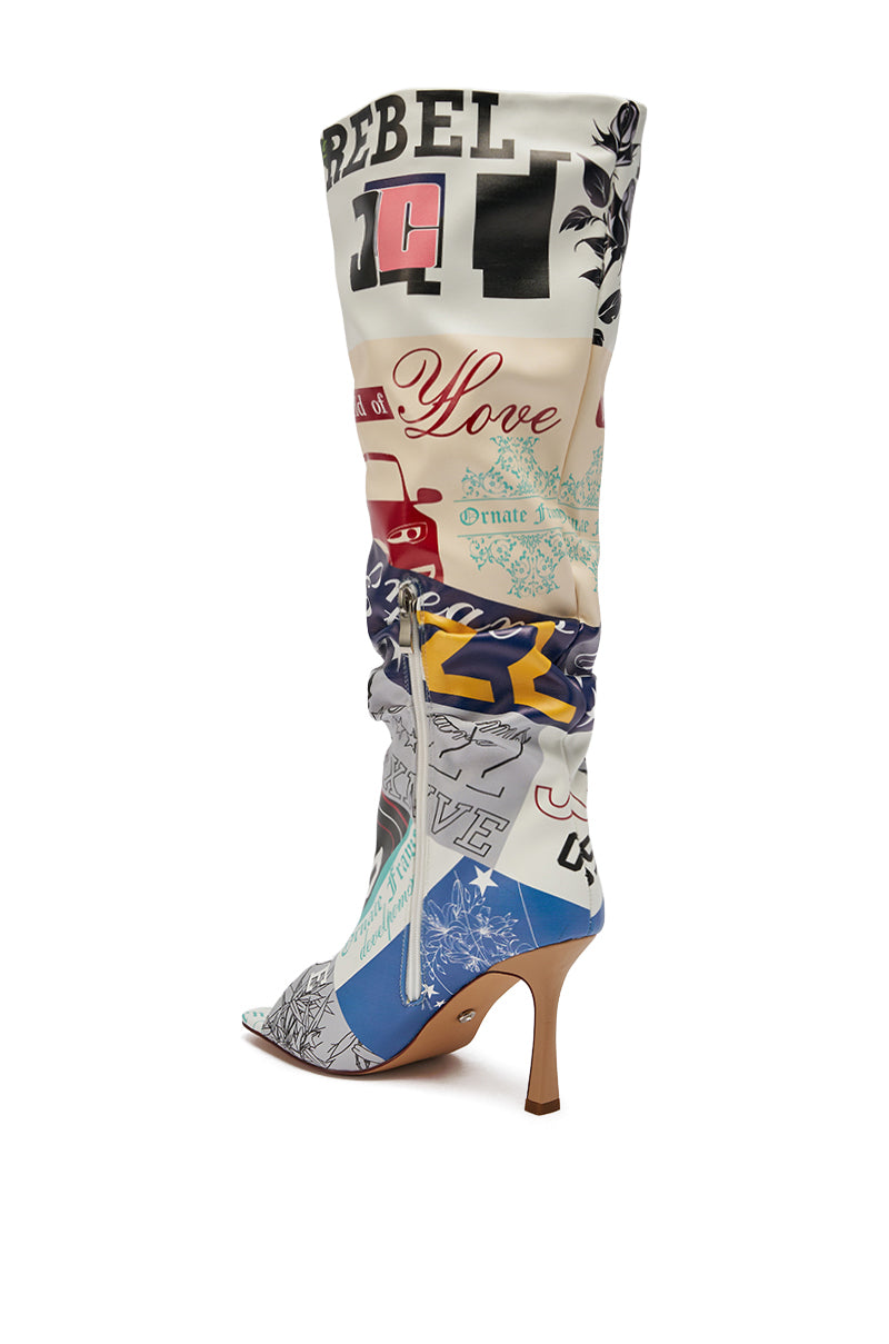 The AZALEA WANG JALISA Multi Novelty Printed Open Toe Boot is a tall, knee-high boot featuring a slouchy fit, open toe, and vibrant collage of graphic prints and patterns in a striking patchwork design on white.