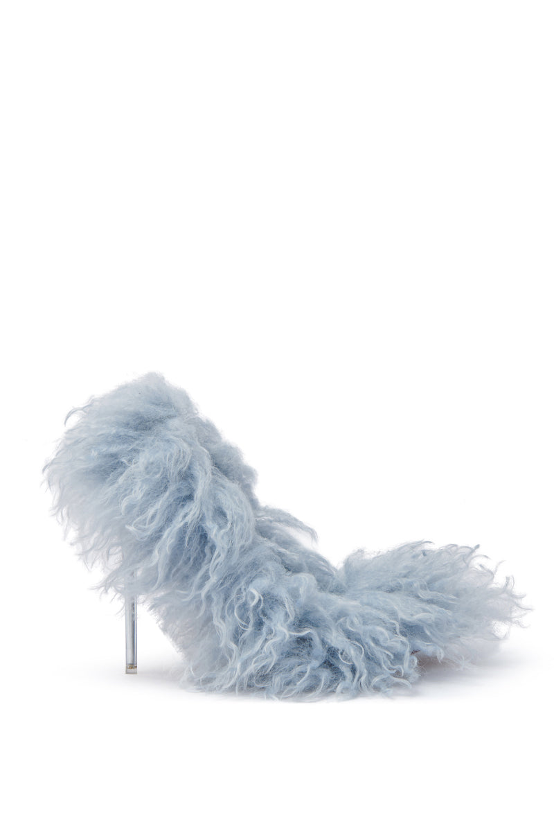 The AZALEA WANG JAMEELA BABY BLUE FUR HEEL features a fluffy, light blue shaggy upper contrasted by a metallic stiletto. This chic pointed toe pump pops against a plain white background.