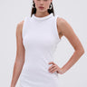 A woman in the IDK FELT CUTE RIBBED KNIT MINI DRESS, a sleeveless fitted mini with a rolled collar, stands confidently against a plain background. She wears her long dark hair in a top knot and accessorizes with large hoop earrings.