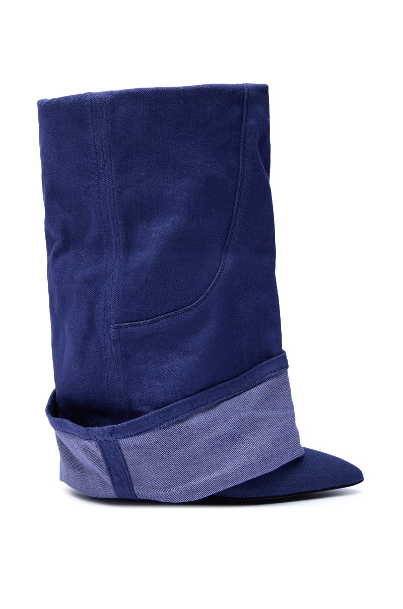 The AZALEA WANG JATIN DENIM CUFF FOLD OVER WEDGE BOOTIE is a slouchy, mid-calf boot in deep blue denim with a folded ankle cuff, pointed toe, and wedge heel, displayed on a white background.