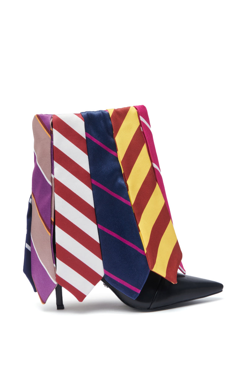 A pointed-toe black stiletto heel draped with colorful striped neckties in red, yellow, purple, and blue—reflecting the bold style of the AZALEA WANG JAUNE BLACK TIE BOOTIE.