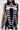 A woman wears the ALL ABOUT IT LACE UP MINI DRESS IN DENIM, a sleeveless dark denim mini with bold white lace-up detailing and metal eyelets across the front and sides for a modern corset-inspired look.