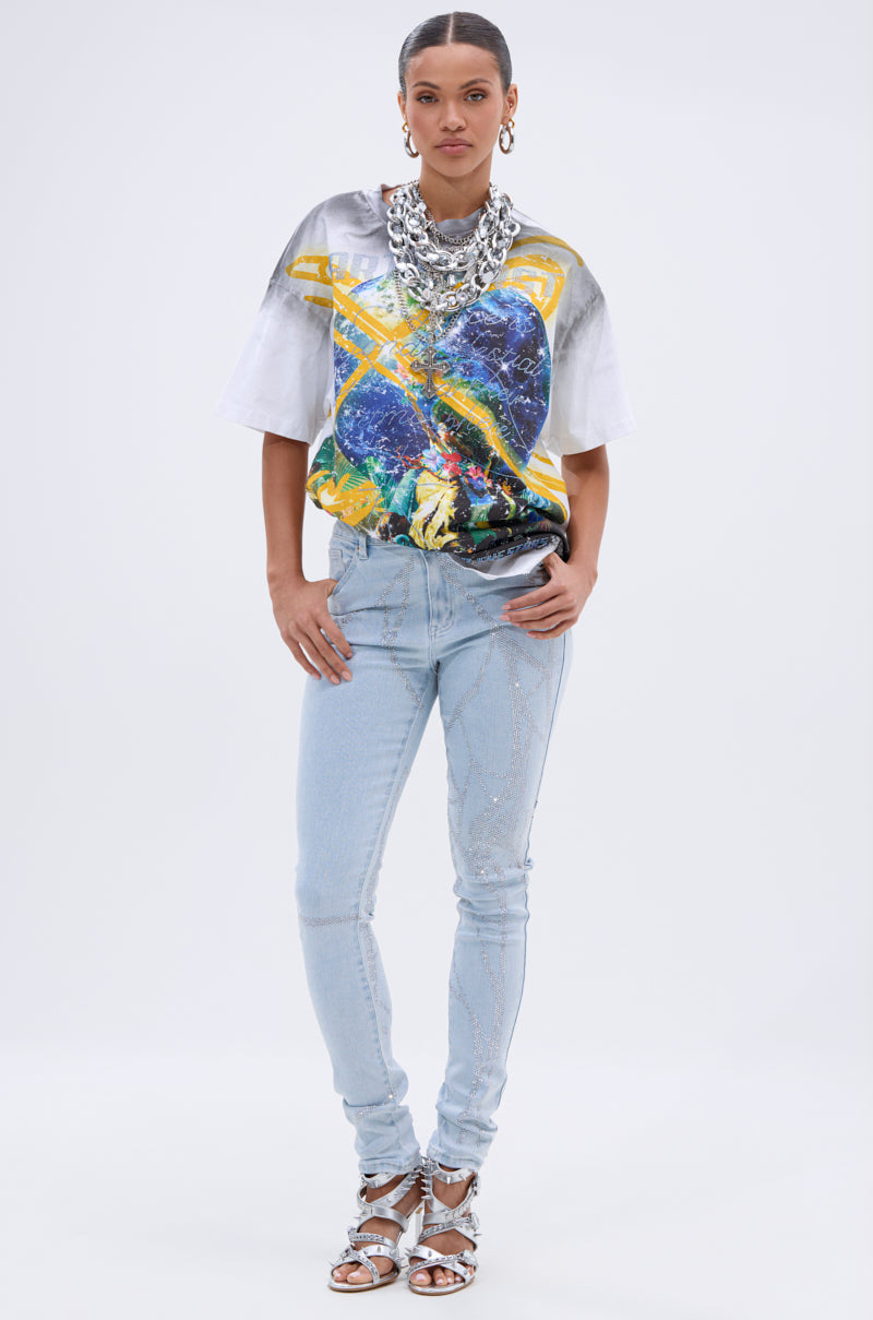 A woman wearing a t-shirt and SPIDER GIRL SKINNY DENIM. 5