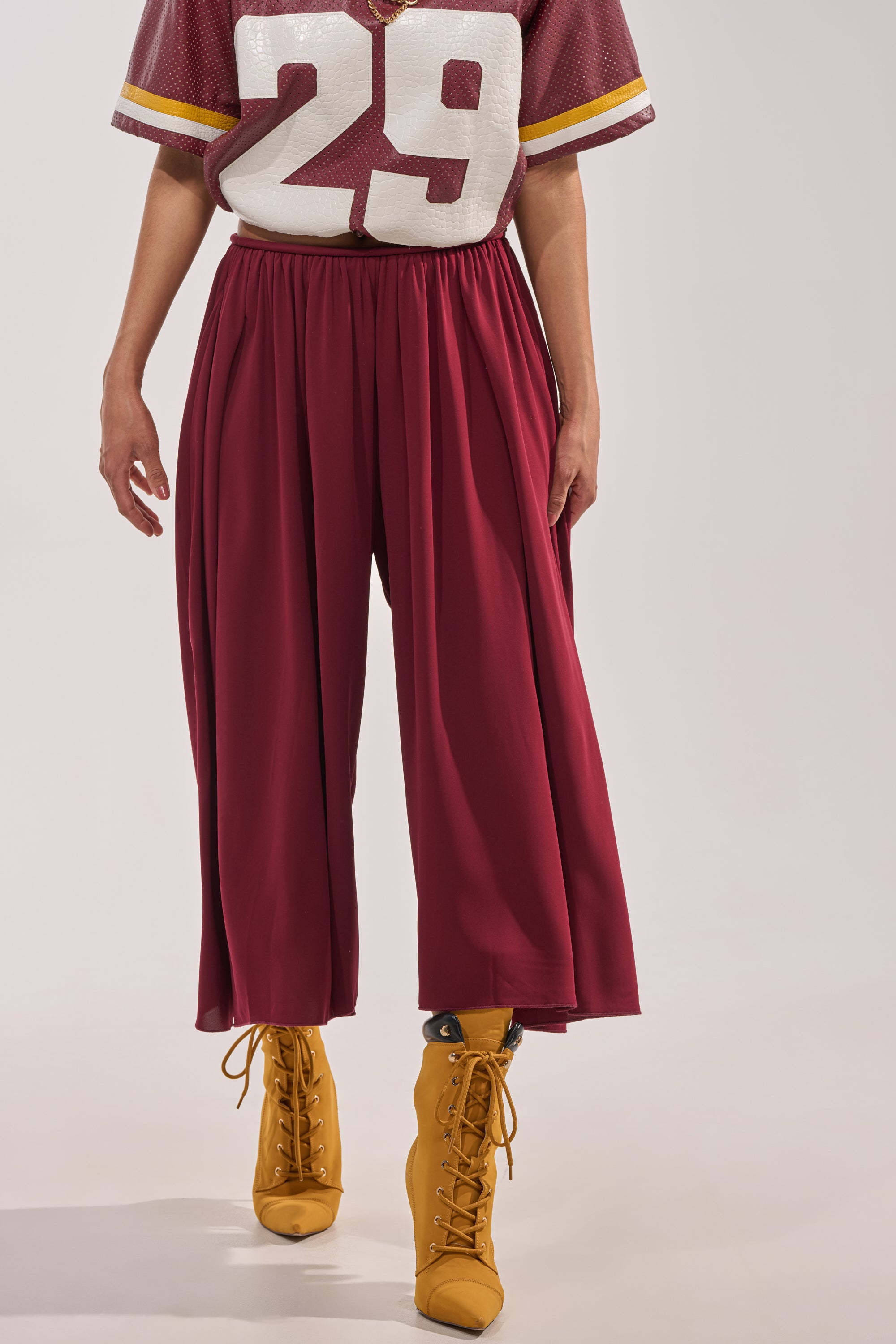 Model wears a red  3