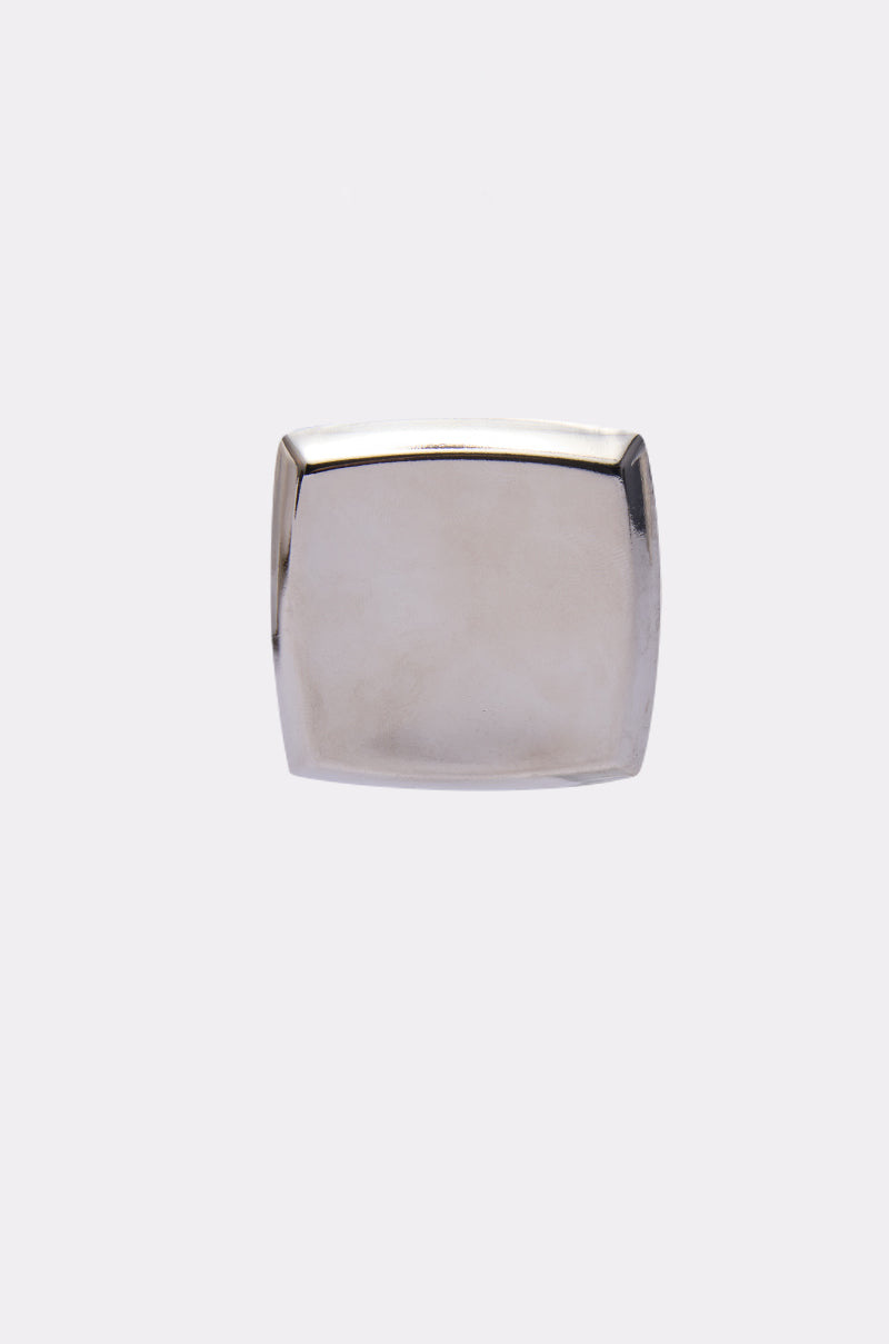 The NOT A SQUARE EARRING, a plain rectangular silver metal ring with slightly rounded corners, is shown against a white background, highlighting its clean lines and modern minimalist style. 3