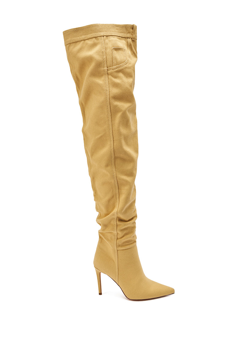 The AZALEA WANG JEANNI Tan Pant Detail Over The Knee Boot, featuring tan suede, a pointed toe, high stiletto heel, and a slouchy shaft, is displayed against a white background.
