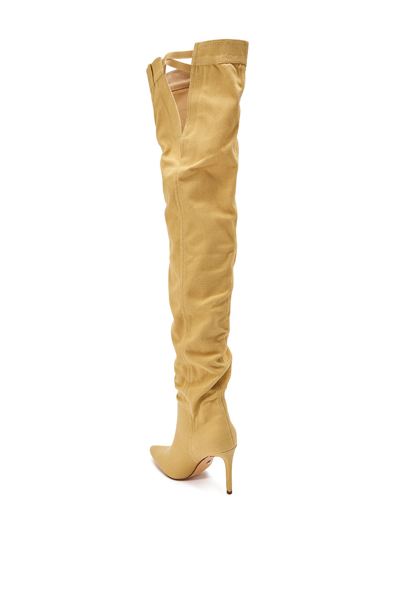 The AZALEA WANG JEANNI Tan Pant Detail Over The Knee Boot features tan suede, a pointed toe, stiletto heel, and crisscross lace-up top detail, shown on a white background.