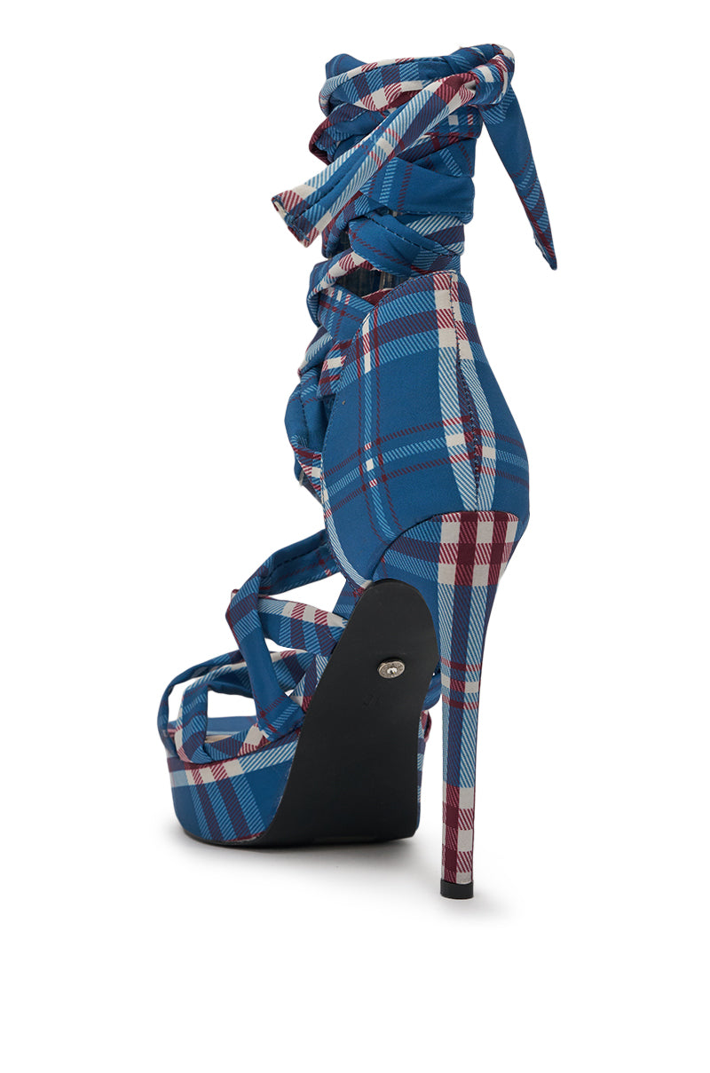 The AZALEA WANG JEMISHA BLUE PLAID PRINT PLATFORM STRAPPY SANDAL features a high stiletto heel, multiple straps, a chic lace-up ankle wrap, and a bold blue, red, and white plaid print for a striking open-toe look. 5