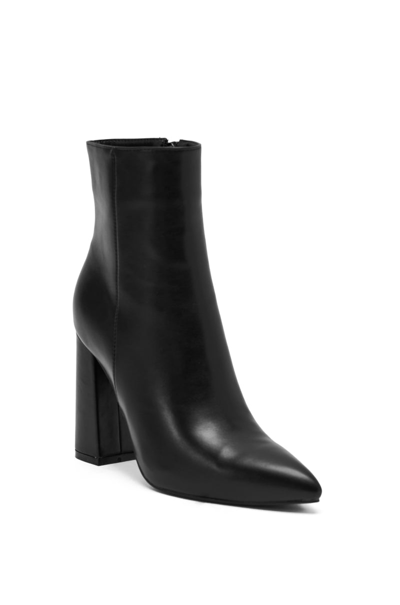 The AZALEA WANG JESSABELL BLACK CHUNKY BOOTIE features a pointed toe, block heel, and sleek faux leather. These stylish booties are showcased on a plain white background.