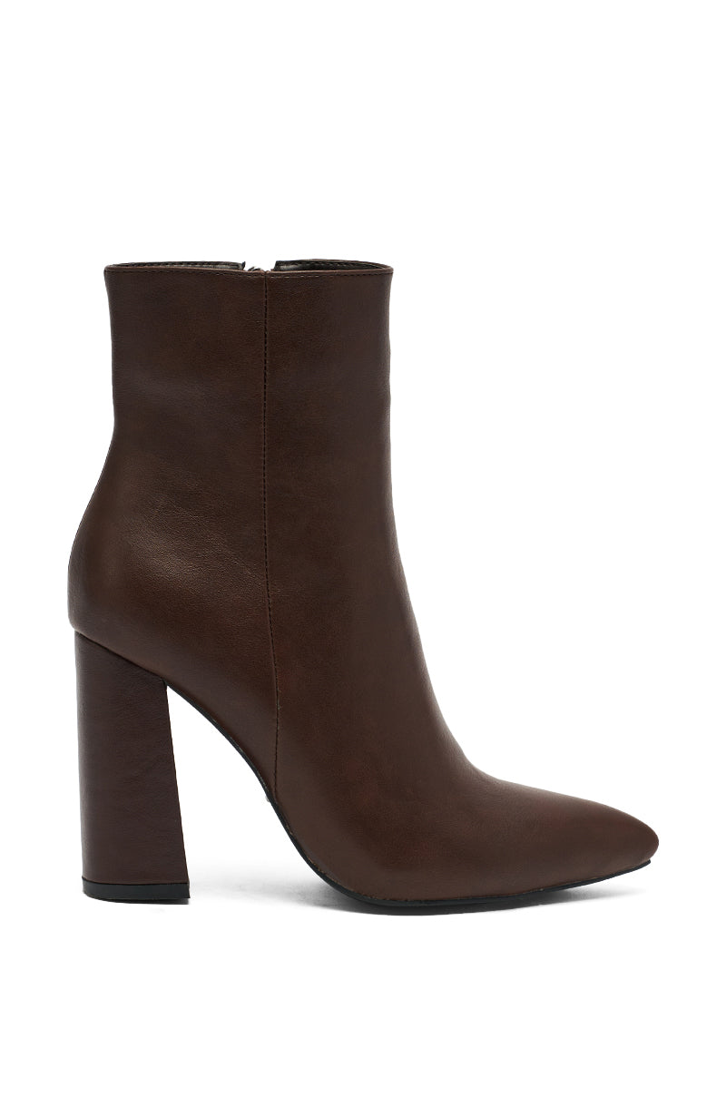 The AZALEA WANG JESSABELL is a brown pointed toe bootie with a high heel.