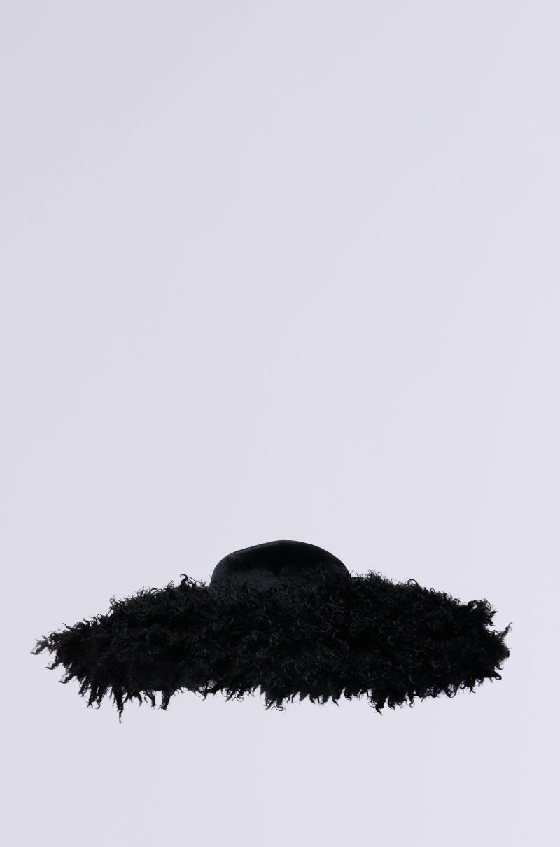 The ALWAYS ELITE FAUX FUR BRIM HAT is a statement accessory with a black wide brim that showcases a feathery texture along the edges, all set against a plain white background.