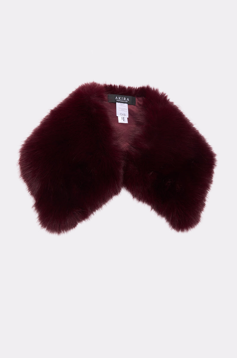 The ALAIA FAUX FUR COLLAR is a dark burgundy shawl with a soft, fluffy texture, displayed flat on a white background. The visible AKIRA label adds a distinctive touch. 5