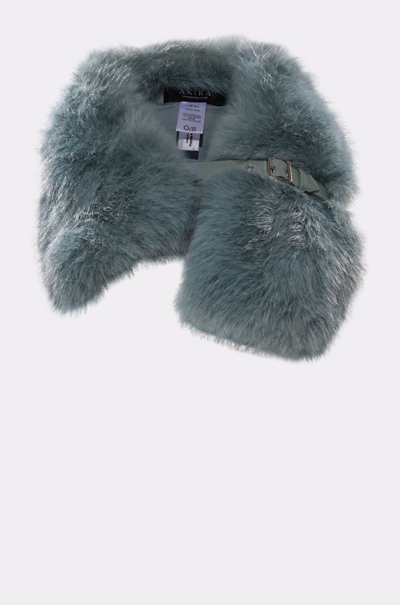 The HAVE IT ALL FAUX FUR SHAWL is a fluffy light blue accessory with a matching belt and buckle, ideal for eveningwear, shown against a simple light background. 3
