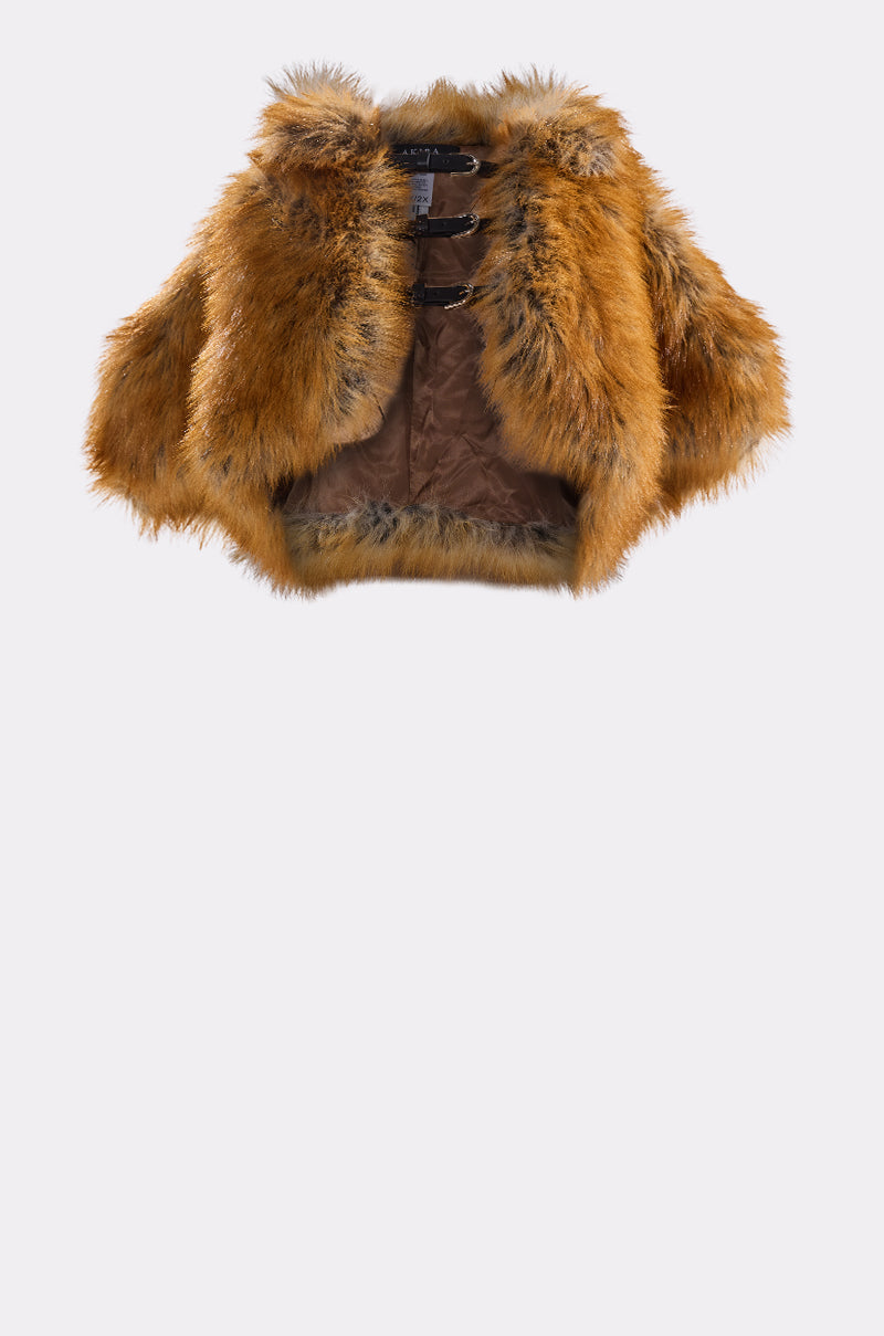 The LUXE LIFE FAUX FUR SHAWL IN BROWN is a cropped, plush-textured faux fur piece with an open front, brown satin lining, and two collar buckle closures—an elegant choice for warmth and style on evenings out.