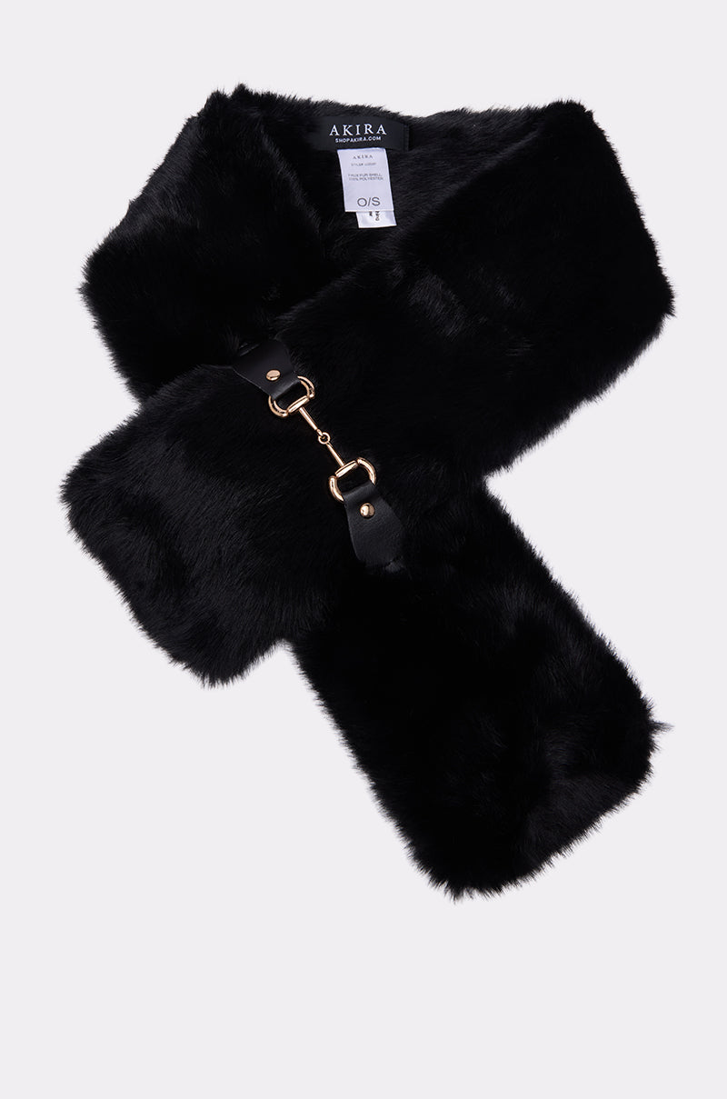 The HORSEBIT FAUX FUR SCARF features black faux fur, a faux leather strap, and gold-tone horsebit hardware. With an "Akira" label, this cozy accessory adds a luxurious touch to any outfit. 2