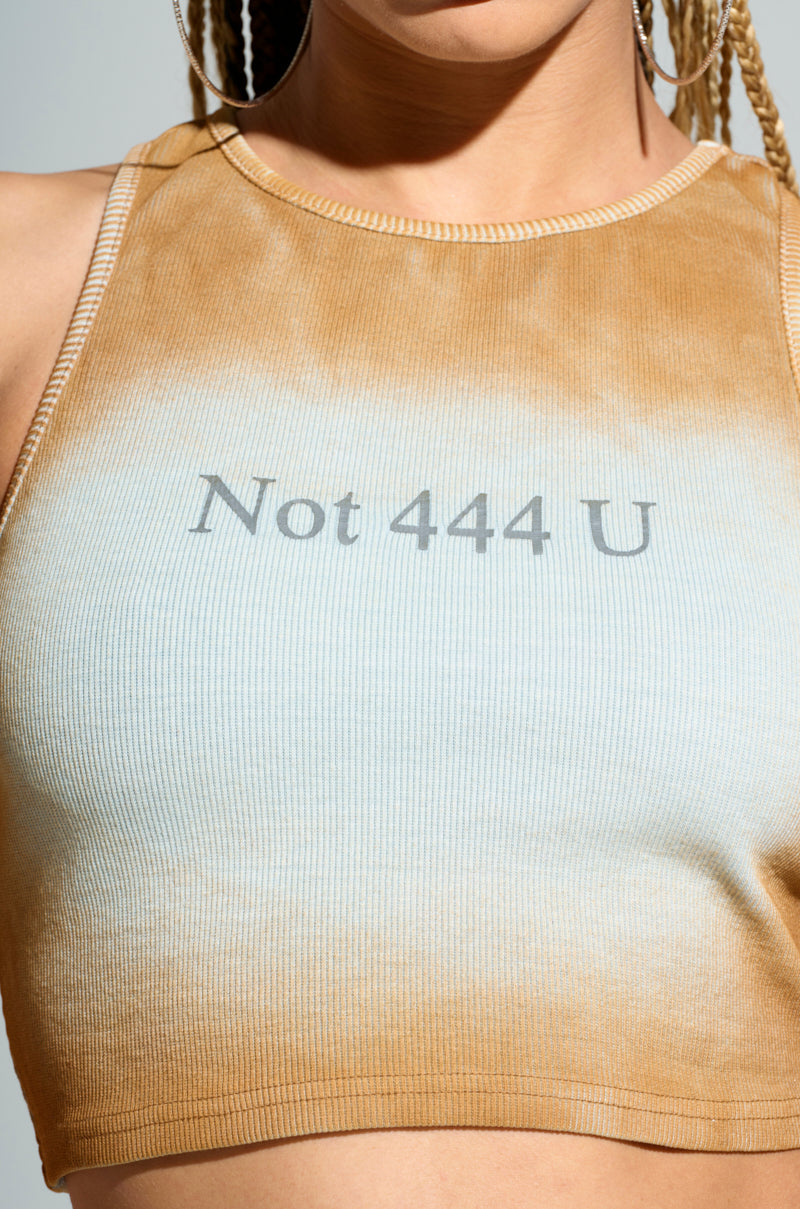 A person is wearing the NOT 444 U TANK from the AKIRA Label, which is a sleeveless, ribbed knit tank showcasing a gradient design that transitions from beige to light blue. The phrase "Not 444 U" is printed in gray across the chest, and braided hair can be seen partially beneath its cropped cut.