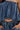A close-up of someone wearing the DENIM FOR DAYS TUBE TOP with matching blue high-waisted drawstring pants—their hands tucked in the pockets, creating a summer-chic vibe.