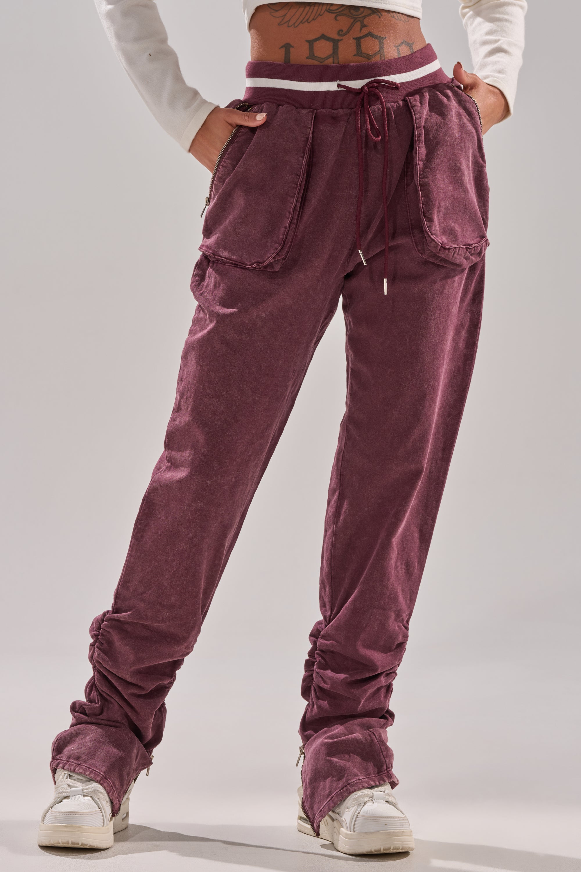 A person wearing Dustin Jogger Pants in Burgundy.