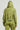 Dressed in an IN MY ELEMENT HOODIE and coordinating pants, a person stands with their back towards the camera, creating a laid-back style with a simple, monochromatic appearance against a plain backdrop.
