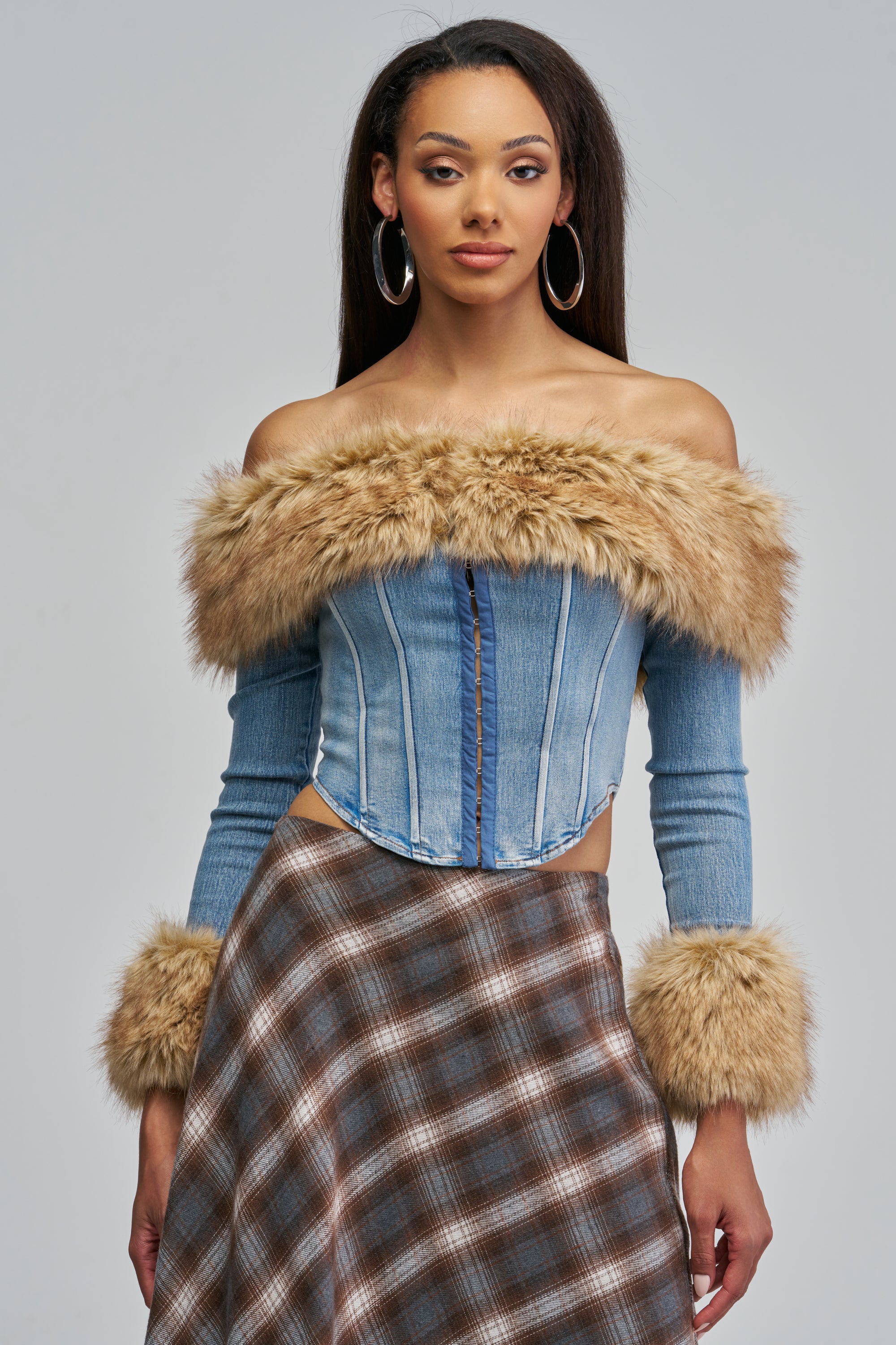 FUR BABY DENIM BLOUSE, an off-the-shoulder denim corset top with long sleeves, featuring faux fur trim at the neckline and cuffs.
