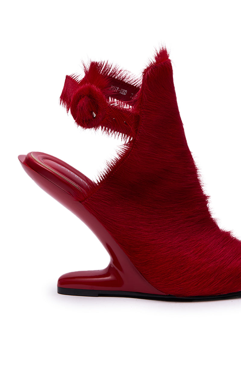 Step out in the AZALEA WANG JOST RED PONY HAIR UPPER WEDGE PUMP—a bold red wedge with sculpted acrylic heel, furry textured upper, and twisted ankle strap detail for standout style. 8