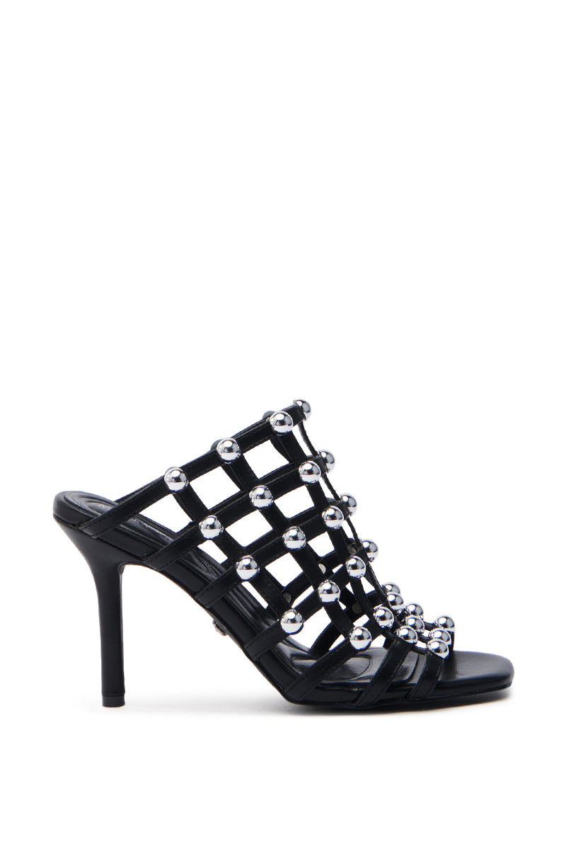The AZALEA WANG JULEATE BLACK CAGED SANDAL features a lattice design in elegant faux leather, adorned with silver metallic spheres, an open toe, and a sleek stiletto heel for a modern and stylish look.